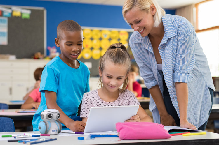 Robot being used in a classroom with students and a teacher