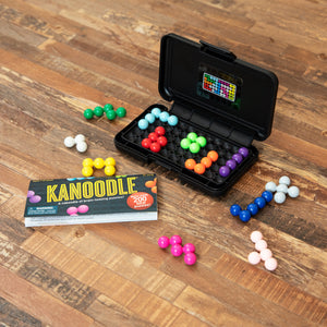 Lifestyle shot of a Kanoodle Game with its pieces and booklet