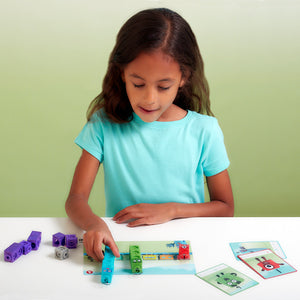 A child playing with the Numberblocks Mathlink Cubes 1-10