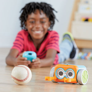 A child playing with Botley The Coding Robot Toy